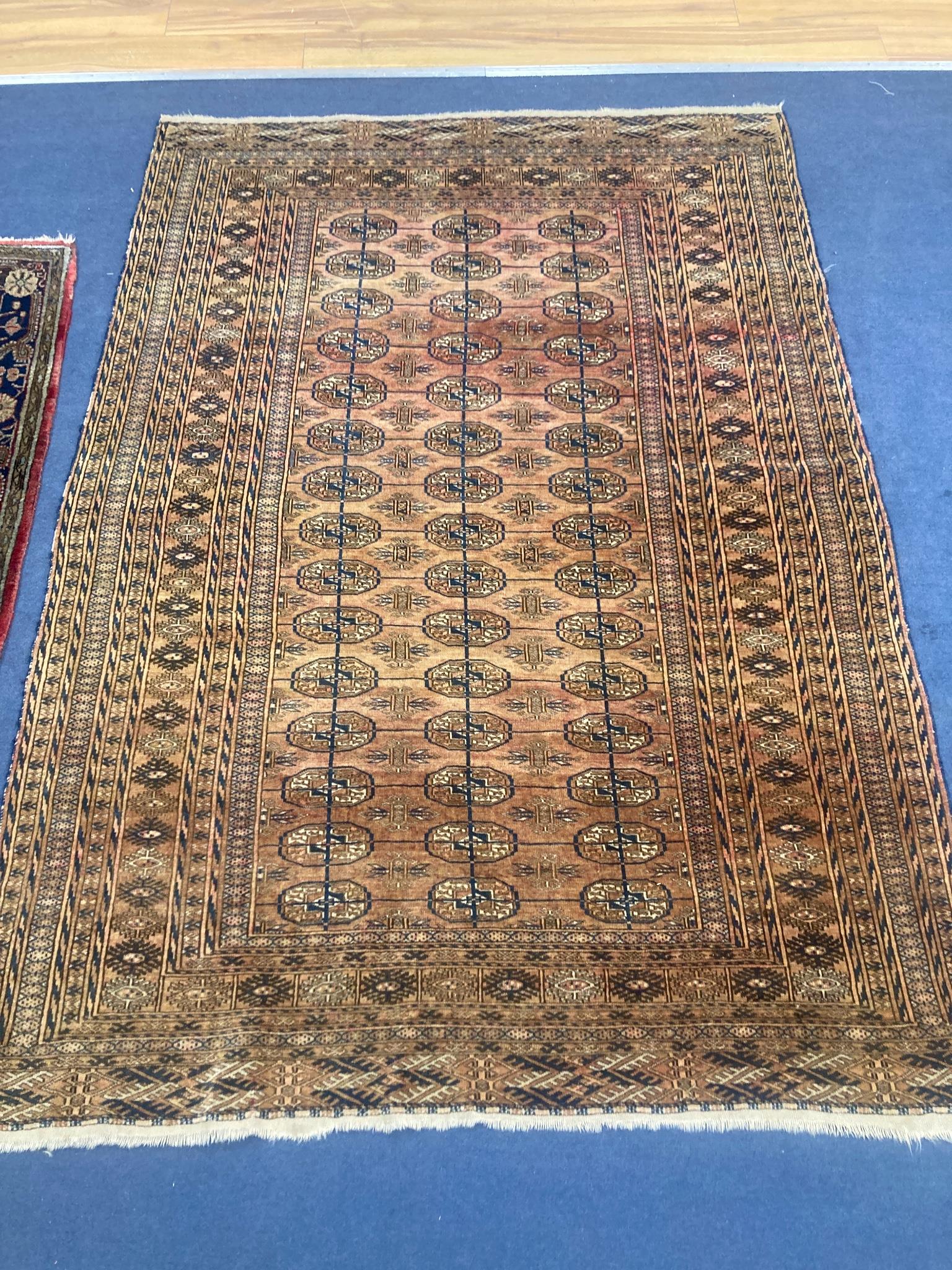 A small Tekke Turkoman pale red ground rug, 210 x 150cm